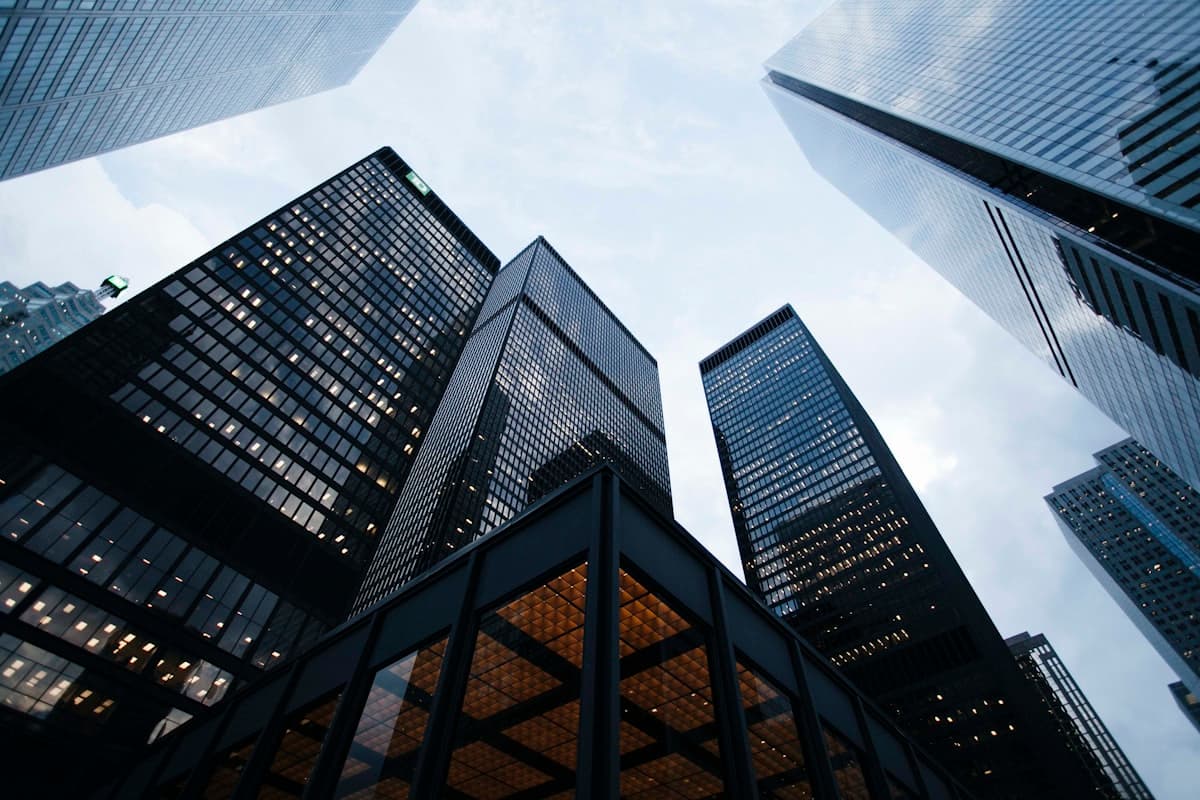 Modern commercial buildings viewed from below.